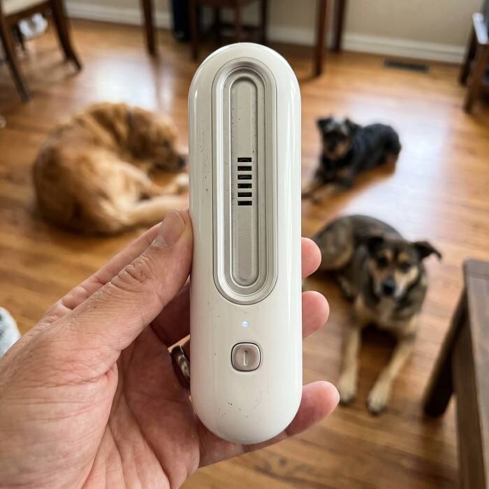 Original customer holding OzoFreshen